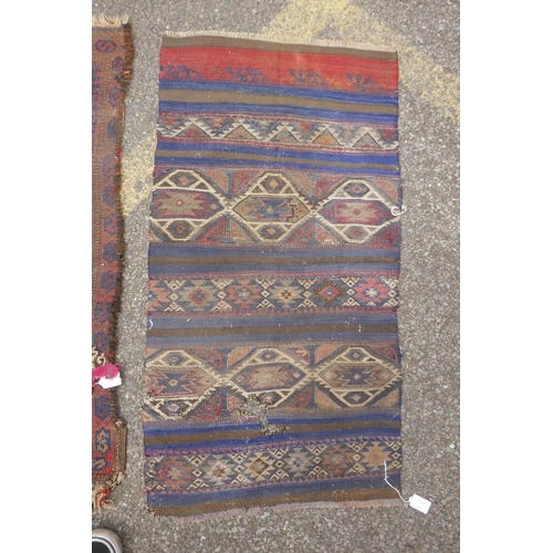 1170 - A red ground Turkish Oushak rug, 94 x 150cm, and an Afghan prayer rug, 60 x 110cm, and a small kilim... 