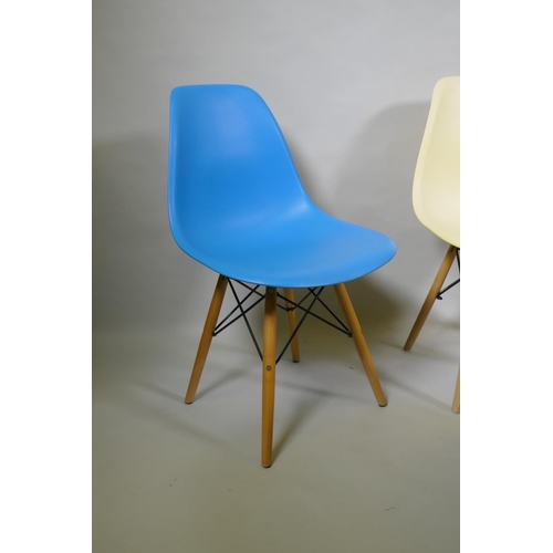 1202 - A set of three Eames style dining chairs and a small occasional table