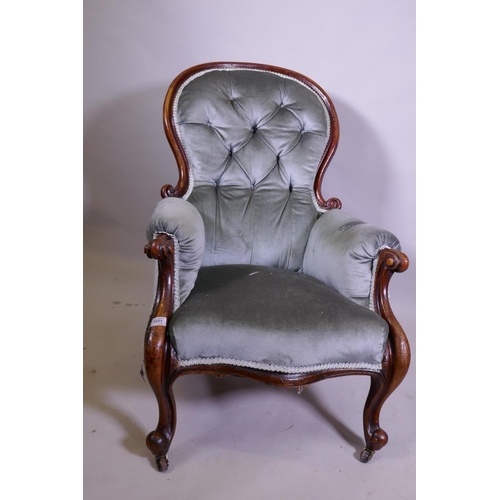 1230 - A Victorian spoon back walnut armchair, raised on cabriole support, back legs AF