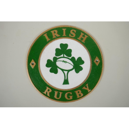 129 - A painted cast iron 'Ireland Rugby' plaque, 24cm diameter