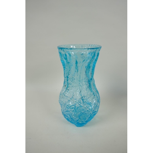 132 - Four pieces of mid C20th German Ingrid Glashutte glassware including three bark textured vases, and ... 