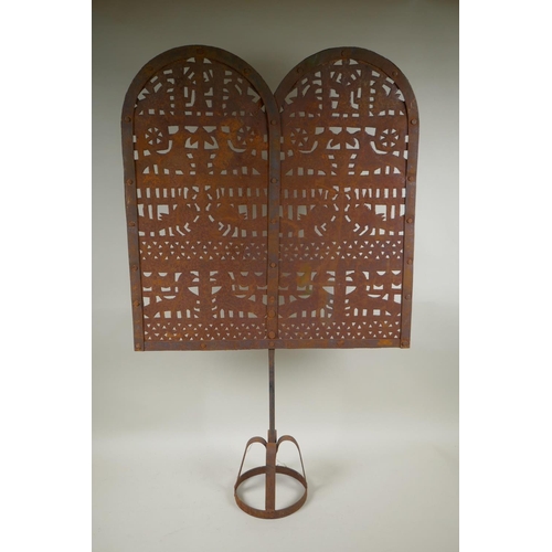 137 - An Indian pierced metal screen decorated with birds, 53  x 86cm