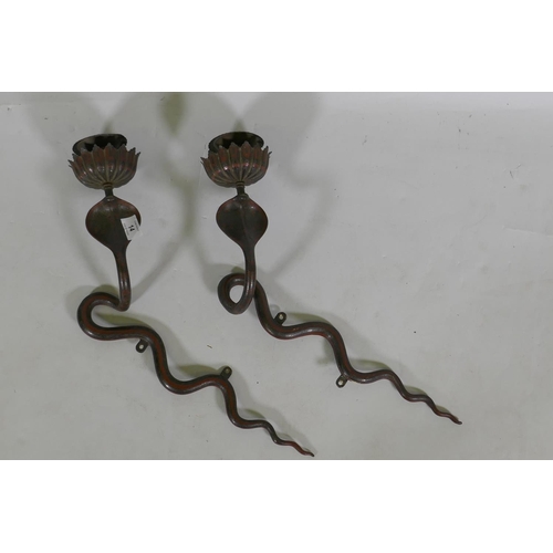 14 - A pair of antique Kashmiri enamelled metal cobra wall sconces, 45cm long