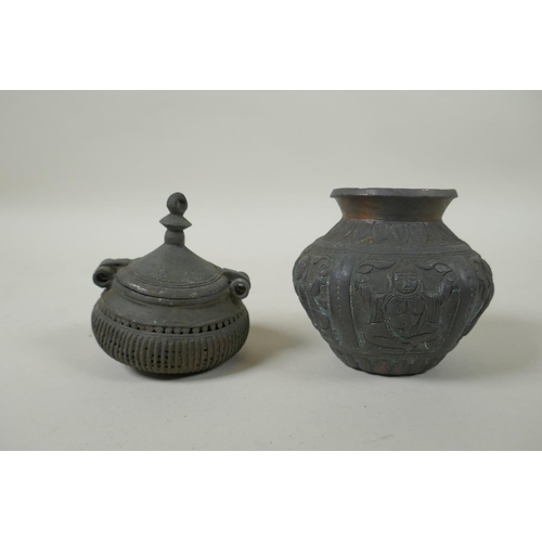 140 - An antique Indian bronze Dhokra money box, and Indian repousse bronze port, and a Tibetan copper tea... 