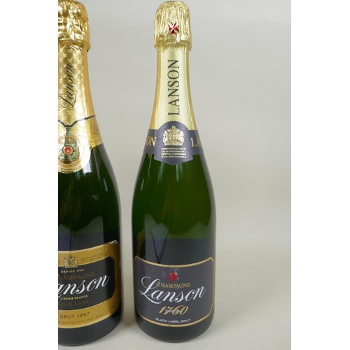 141 - Three bottles of Lanson Gold Label Brut Champagne 1997, and a bottle of Lanson Black Label Brut 2015