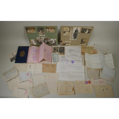 147 - An archive of WWI ephemera comprising numerous letters from the front line, military documents, pass... 