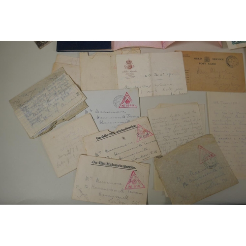 147 - An archive of WWI ephemera comprising numerous letters from the front line, military documents, pass... 