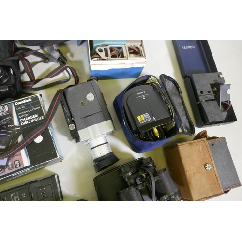 148 - A quantity of 35mm cameras, Pentax and Olympus bodies, Prinzlux binoculars, camera equipment, flashe... 