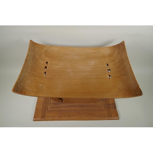 150 - An African carved hardwood Ashanti tribal stool, with personalised dedication to Mark Gilbey from Ko... 