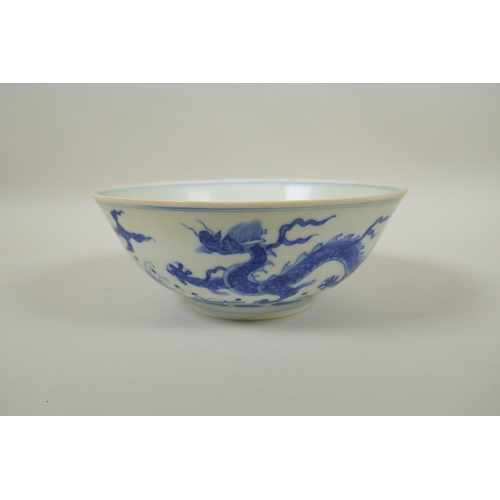 170 - A Chinese blue and white porcelain bowl decorated with dragons, Chenghua 6 character mark to base, 1... 