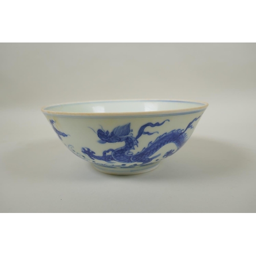 170 - A Chinese blue and white porcelain bowl decorated with dragons, Chenghua 6 character mark to base, 1... 