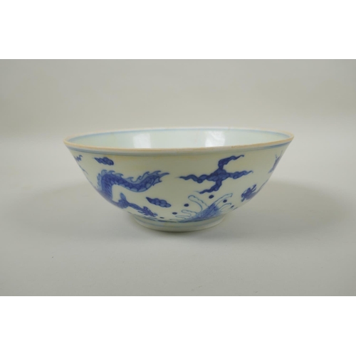 170 - A Chinese blue and white porcelain bowl decorated with dragons, Chenghua 6 character mark to base, 1... 