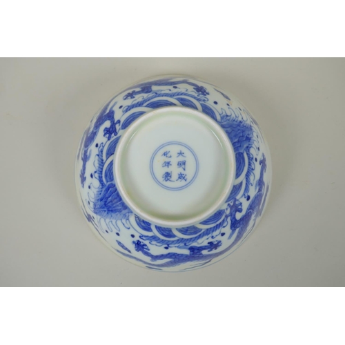 170 - A Chinese blue and white porcelain bowl decorated with dragons, Chenghua 6 character mark to base, 1... 