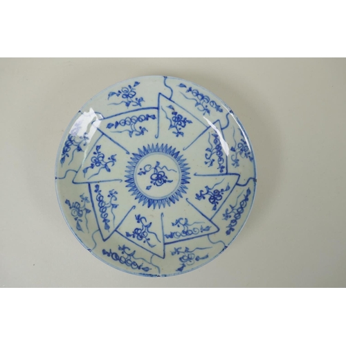 174 - A Chinese antique blue and white porcelain dish with shaped rim and repeating design, and another an... 