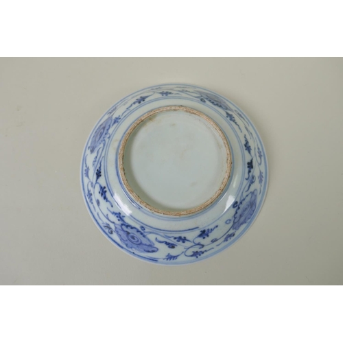 174 - A Chinese antique blue and white porcelain dish with shaped rim and repeating design, and another an... 