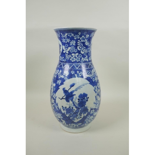 183 - A Chinese Republic blue and white porcelain vase with decorative panels depicting birds within a fie... 