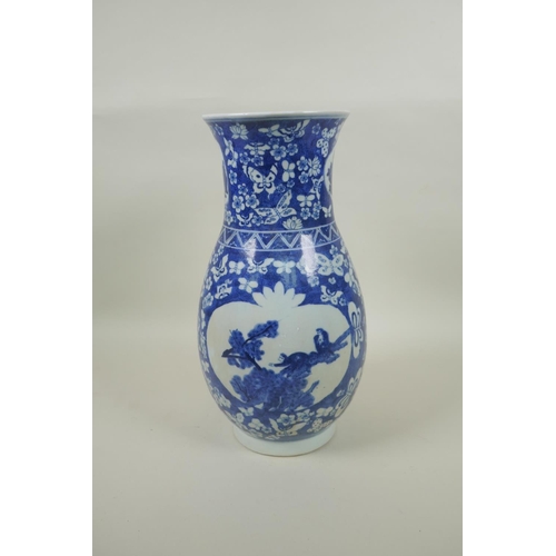 183 - A Chinese Republic blue and white porcelain vase with decorative panels depicting birds within a fie... 