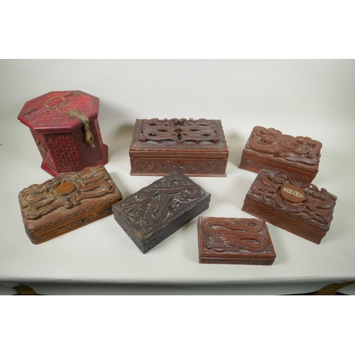 185 - A collection of C19th and C20th Burmese carved camphor wood and hardwood jewellery boxes with dragon... 