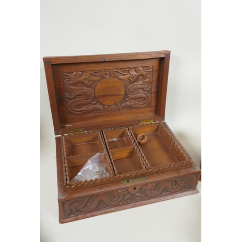 185 - A collection of C19th and C20th Burmese carved camphor wood and hardwood jewellery boxes with dragon... 