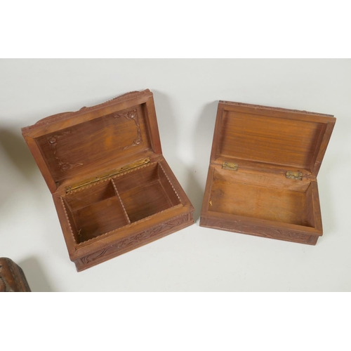 185 - A collection of C19th and C20th Burmese carved camphor wood and hardwood jewellery boxes with dragon... 