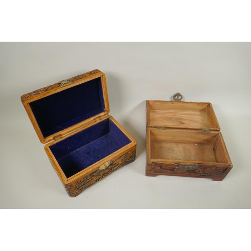 186 - A collection of C19th and C20th Chinese carved camphor wood and hardwood jewellery boxes with dragon... 