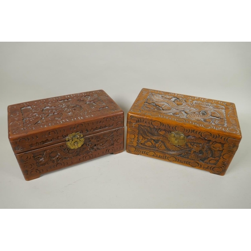 186 - A collection of C19th and C20th Chinese carved camphor wood and hardwood jewellery boxes with dragon... 