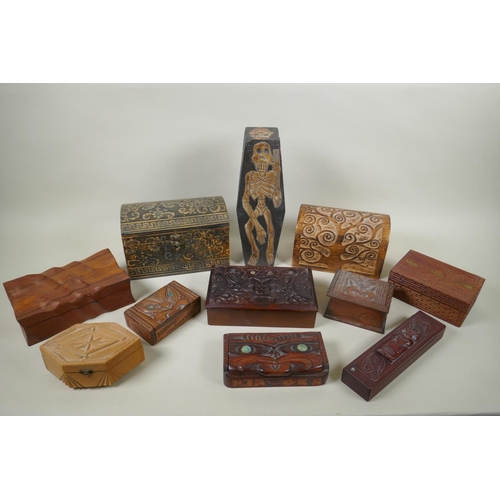 187 - A quantity of Tiki and Indian hardwood and cork jewellery/trinket boxes of assorted sizes and design... 