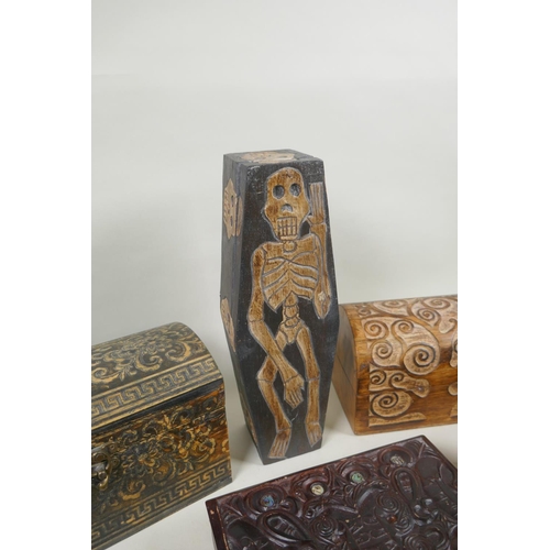 187 - A quantity of Tiki and Indian hardwood and cork jewellery/trinket boxes of assorted sizes and design... 