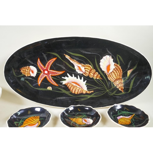 189 - A vintage French Henriot Quimper pottery oyster set comprising serving dish, bowl and nine side dish... 