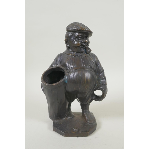 190 - A bronze desk stand in the form of a golfer, 19cm high