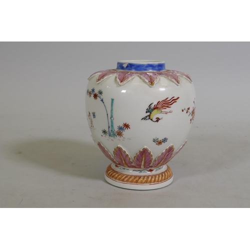 199 - An early C18th Meissen tea caddy with Kakiemon decoration, painted with phoenix amongst blossoms and... 