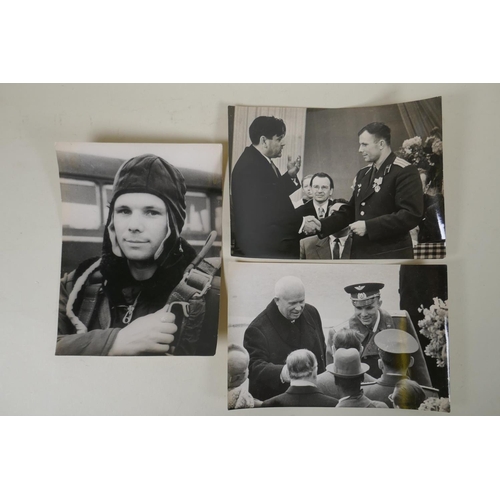 204 - Three vintage black and white press photographs of Yuri Gagarin, including one with Nikita Khrushche... 