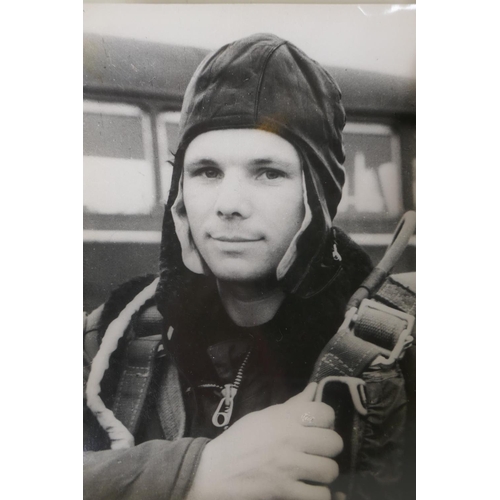 204 - Three vintage black and white press photographs of Yuri Gagarin, including one with Nikita Khrushche... 