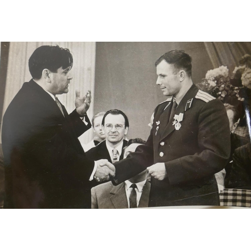 204 - Three vintage black and white press photographs of Yuri Gagarin, including one with Nikita Khrushche... 