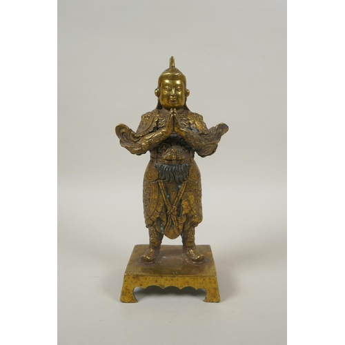 208 - A Chinese gilt bronze figure of Wei Tuo Pusa, impressed 4 character mark verso, 23cm high