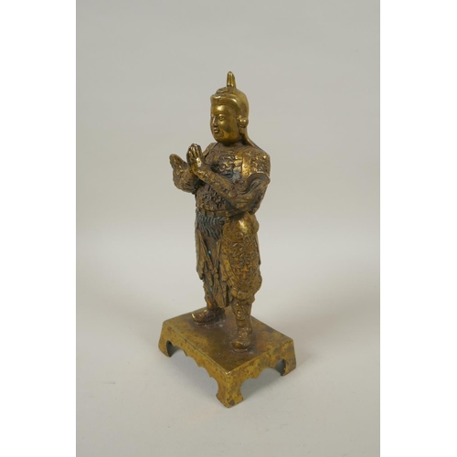 208 - A Chinese gilt bronze figure of Wei Tuo Pusa, impressed 4 character mark verso, 23cm high