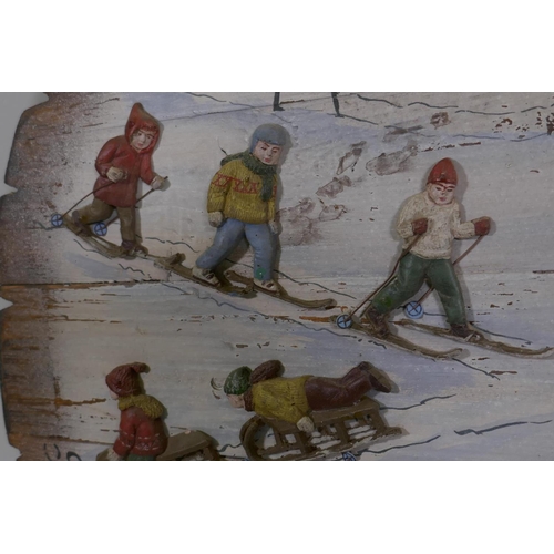 22 - A decorative painted pine panel celebrating French winter sports, 64cm diameter