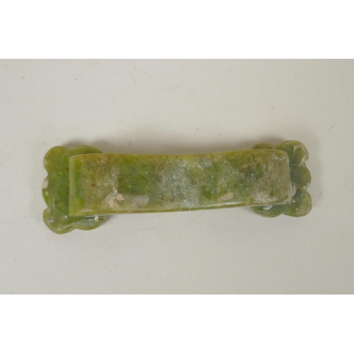 221 - A Chinese carved green hardstone ruyi, 10cm