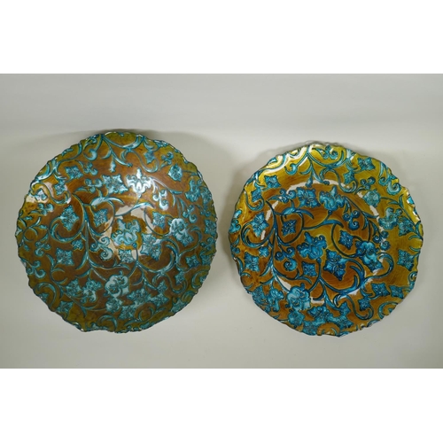 222 - A teal and gilt painted moulded glass bowl and matching charger with scrolling floral decoration, 42... 