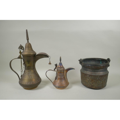 224 - A middle eastern brass coffee pot with chased decoration, a smaller white metal coffee pot and an an... 