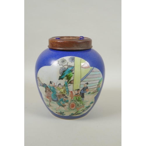 228 - An early C20th Chinese blue ground porcelain ginger jar and wooden cover, the vase with famille vert... 