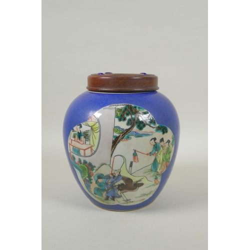 228 - An early C20th Chinese blue ground porcelain ginger jar and wooden cover, the vase with famille vert... 