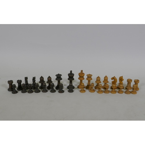 23 - An antique box wood chess set, in mahogany case, king 7.5cm high