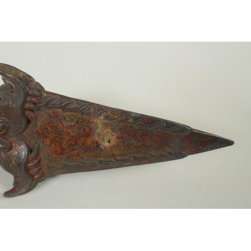 232 - A Tibetan ceremonial bronze vajra with the remnants of gilt patina, 29cm long