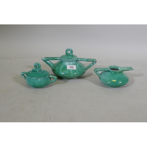 239 - A vintage Art Deco style three piece emerald glazed tea set, tea pot 13cm high