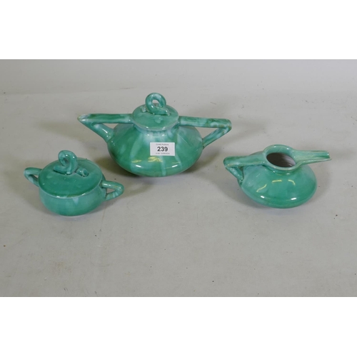 239 - A vintage Art Deco style three piece emerald glazed tea set, tea pot 13cm high