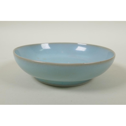 240 - A Chinese ru ware style shallow porcelain dish, 14cm diameter