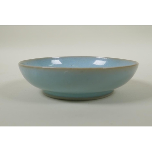 240 - A Chinese ru ware style shallow porcelain dish, 14cm diameter