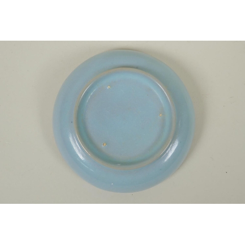 240 - A Chinese ru ware style shallow porcelain dish, 14cm diameter