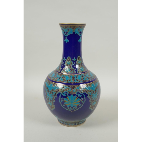 248 - A Chinese blue ground porcelain vase with gilt and turquoise floral decoration, Qianlong seal mark t... 